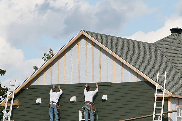 Professional Siding Replacement technician working in Raleigh, NC